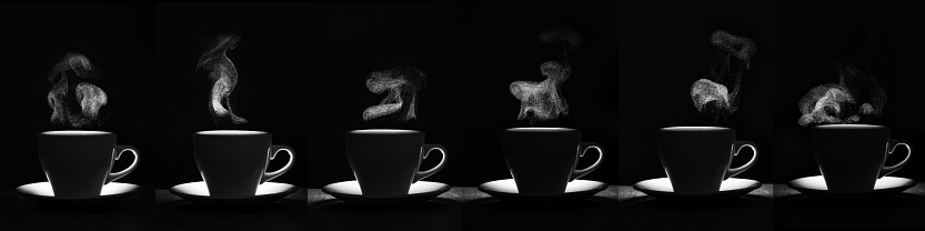 A set of white mugs with a warm drink and a curly fantasy steam rising up on a black background, creative, layout, silhouette. A steaming coffee cup and saucer. Morning coffee.