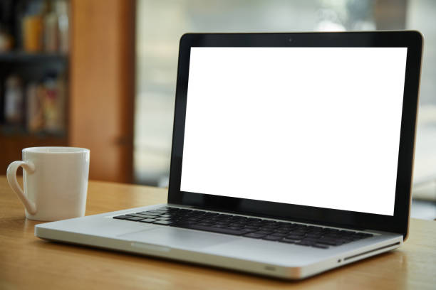 istock A laptop with a blank screen on a coffee table 1470292280