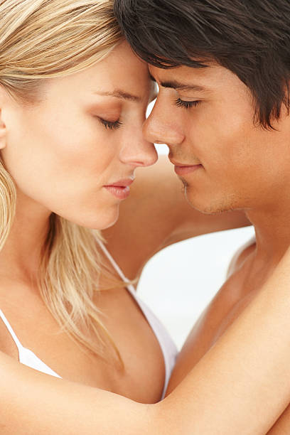 istock Close-up of a romantic young  couple embracing 147029308