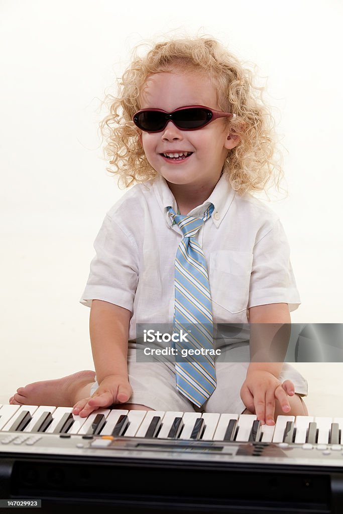 Petit Joueur de piano - Photo de Assis libre de droits