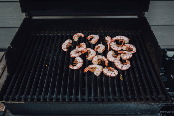 istock Loose prawns on the barbecue grill 1470300139