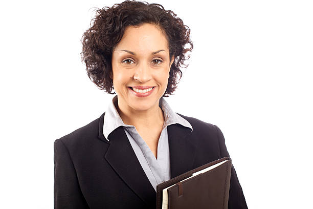 Successful businesswoman with leather notebook stock photo