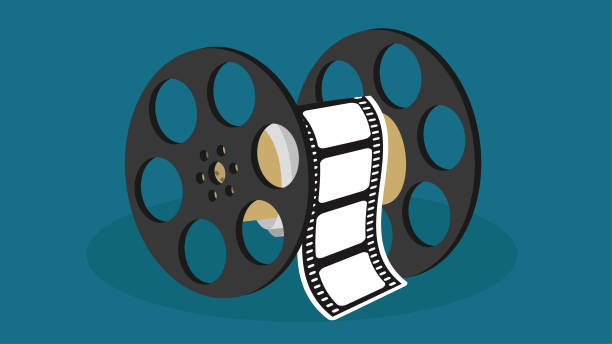 istock Film reel with film strip on a blue background. 1470305558