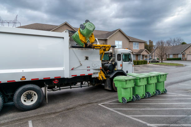 istock Garbage Truck Picking Up And Dumping Residential Trash Containers 1470305585