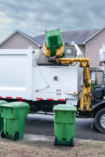 istock Mechanized Garbage Truck Dumping Trash From Residential Barrel 1470305592