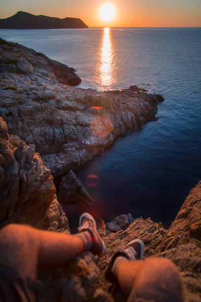 A top view of a person resting when the sun comes out.