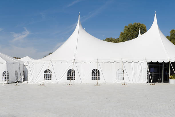 istock Large White Wedding Tent and Plastic Ground Cover 147031339