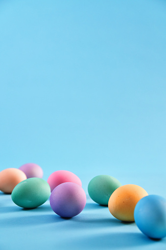 Easter Festival Backgrounds with colored eggs on white background with copy space, Minimal Concept