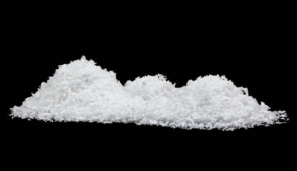 istock White snow isolated on a black background. Snow hills. 1470314247