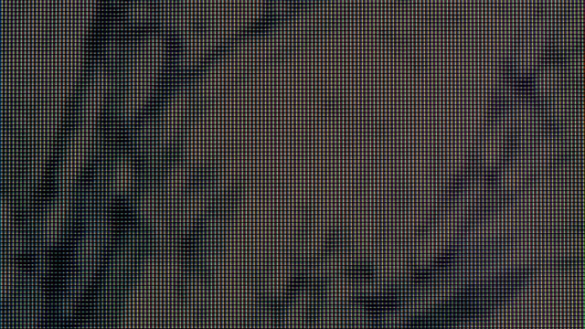 Macro View of a Television LCD Screen at the Time of Broadcasting a TV Program