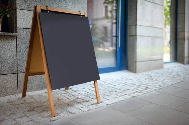istock Blank advertising A-board near cafe. Mockup for design 1470322824