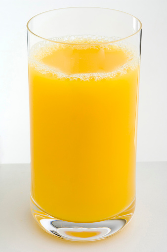 oranges and orange slices of orange juice on a white background