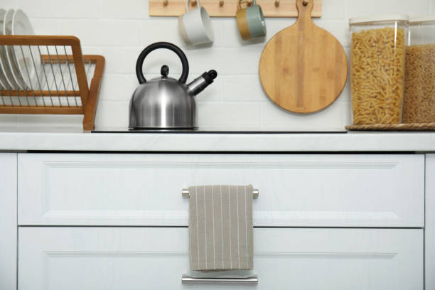 istock Clean towel hanging on drawer handle in kitchen 1470327107