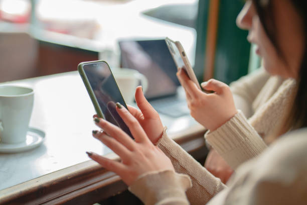 istock Close up to smart phone  that young female using 1470327236