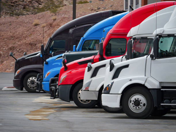istock Row of  parked Semi Trucks 1470331193