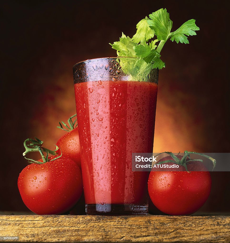 Tomato juice Tomato juice in wet glass with celery Celery Stock Photo