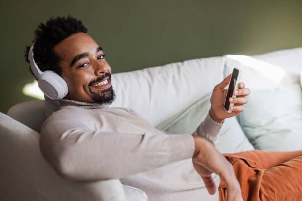 istock An African American young man chilling on the sofa 1470334017