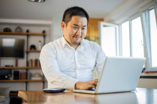 istock Young fashionable man working at home 1470334679