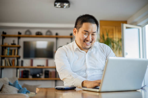 istock Young fashionable man working at home 1470334689