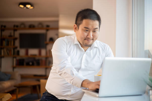 istock Young fashionable man working at home 1470334825