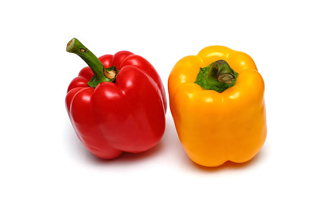 two sweet peppers isolated on white stock photo