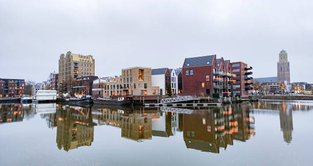 istock Buildings reflecting in the water 1470339177