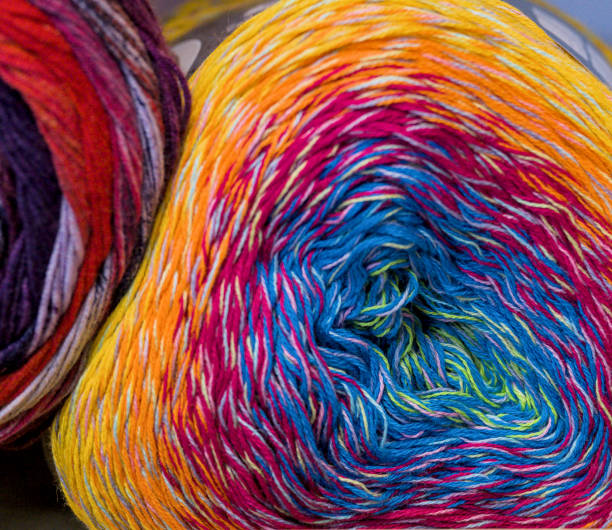 istock Multicolored skeins of wool for knitting as a background. 1470343154