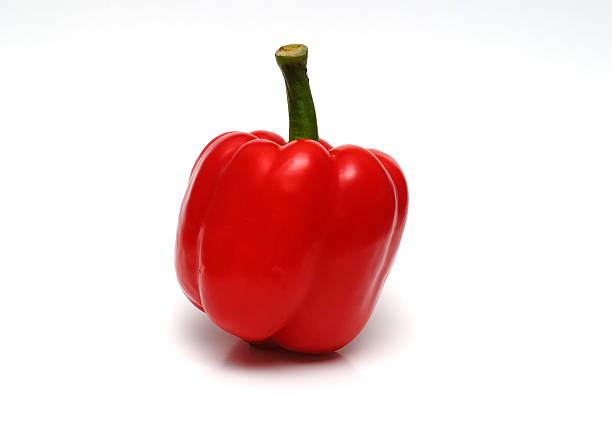 red sweet pepper isolated on white stock photo