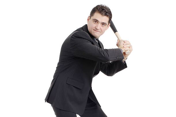 istock Person with a baseball bat preparing to strike 147034459