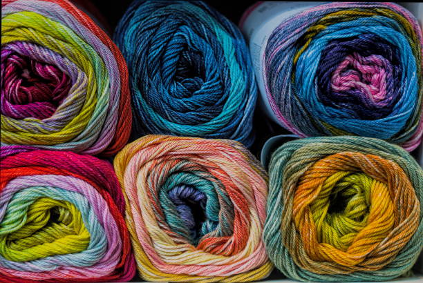 istock Multicolored skeins of wool for knitting as a background. 1470344809