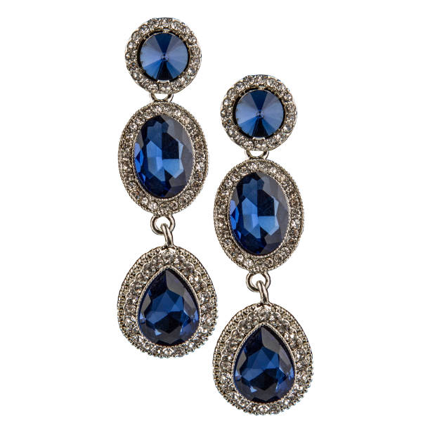 istock Silver pendant with a blue diamond sapphire on a white background 1470346860