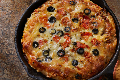 Deep Dish Skillet Greek Pizza with Ground Beef, Roasted Tomatoes, Onions, Black Olives Feta and Mozzarella Cheese