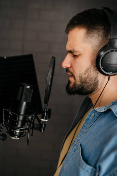 istock Young man recording a song 1470354490