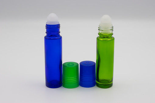 Blue and green aromatherapy roll on bottles