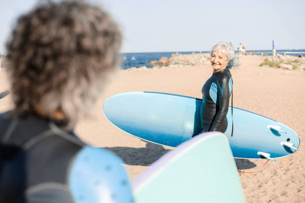 istock Senior woman having fun surfing with her husband 1470355214
