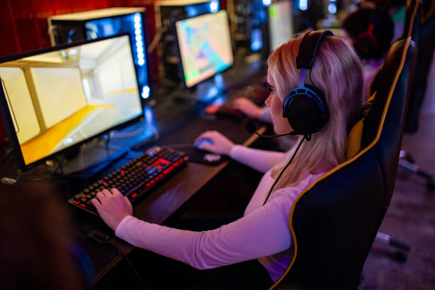 istock Woman playing video game 1470358231