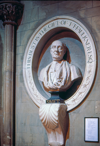 Dublin, Ireland - July 16, 1986: 1980s old Positive Film scanned, the bust of Jonathan Swift in St Patrick's Cathedral, Dublin, Ireland.