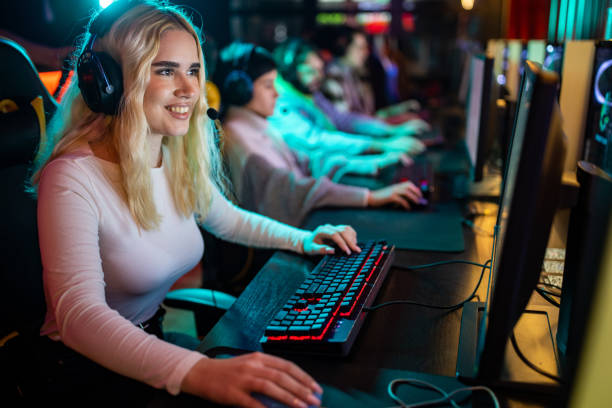 istock Female gamer playing with friends 1470359354