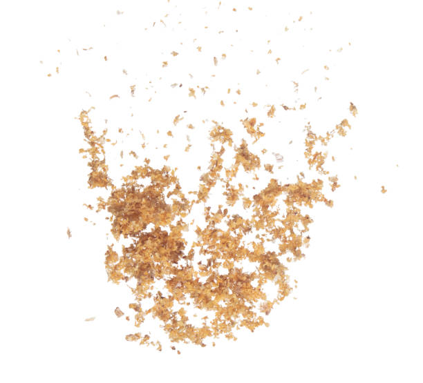 istock Fried Garlic pour fall down explosion, golden yellow fried garlic float abstract fly. Beautiful fried garlic splash stop in air, food object design. White background isolated high speed freeze 1470359544