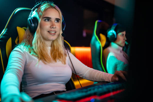 istock Woman playing video game 1470359656