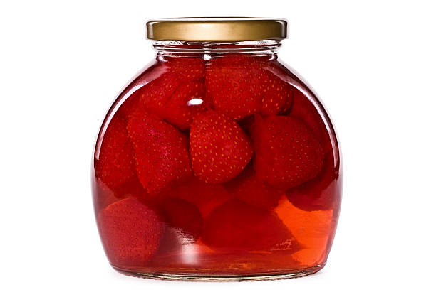 istock jar of strawberry compote, isolated 147036060