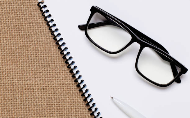 istock diary, glasses and ballpoint pen for notes 1470365153