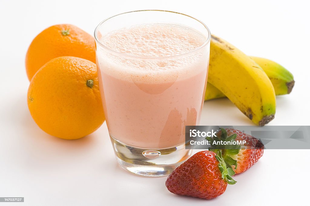 delicious refreshing strawberry orange banana milkshake natural delicious refreshing strawberry orange banana milkshake natural isolated Banana Stock Photo