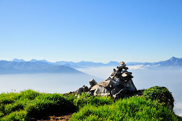 Stacked Stones on top of a mountain stock photo