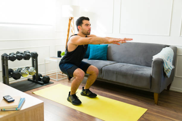 istock Active man in his 20s training at his home gym 1470376211