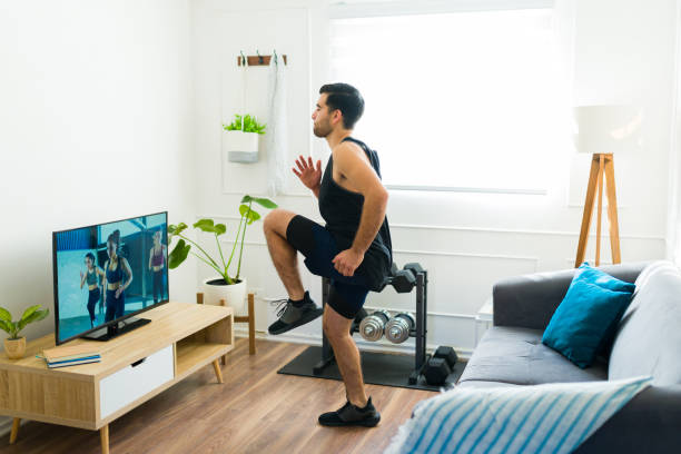 istock Active man working out with cardio and running at home 1470377078