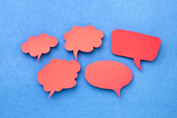 istock Red speech bubble or text box made of color paper cut. 1470377576