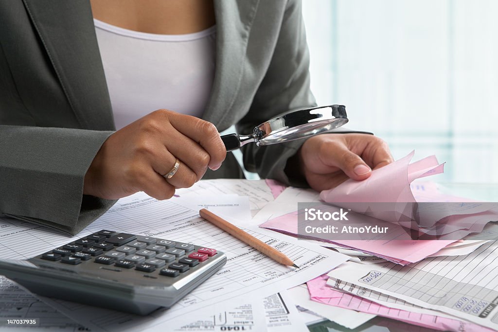 Woman checking bills Document Stock Photo