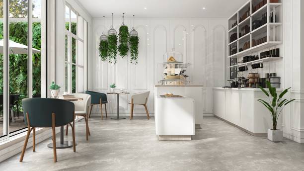istock Modern, luxury design cafe, corrugated counter with espresso machine, cabinet, shelf, coffee table, chair in sunlight from glass window by garden on white wainscot wall and cement floor 1470383248