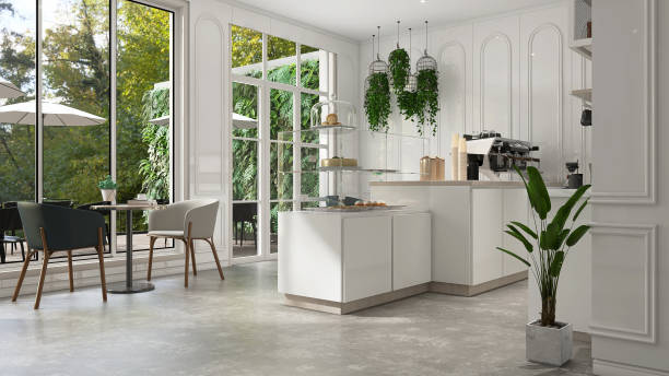 Modern, luxury design cafe, corrugated counter with espresso machine, cabinet, shelf, coffee table, chair in sunlight from glass window by garden on white wainscot wall and cement floor